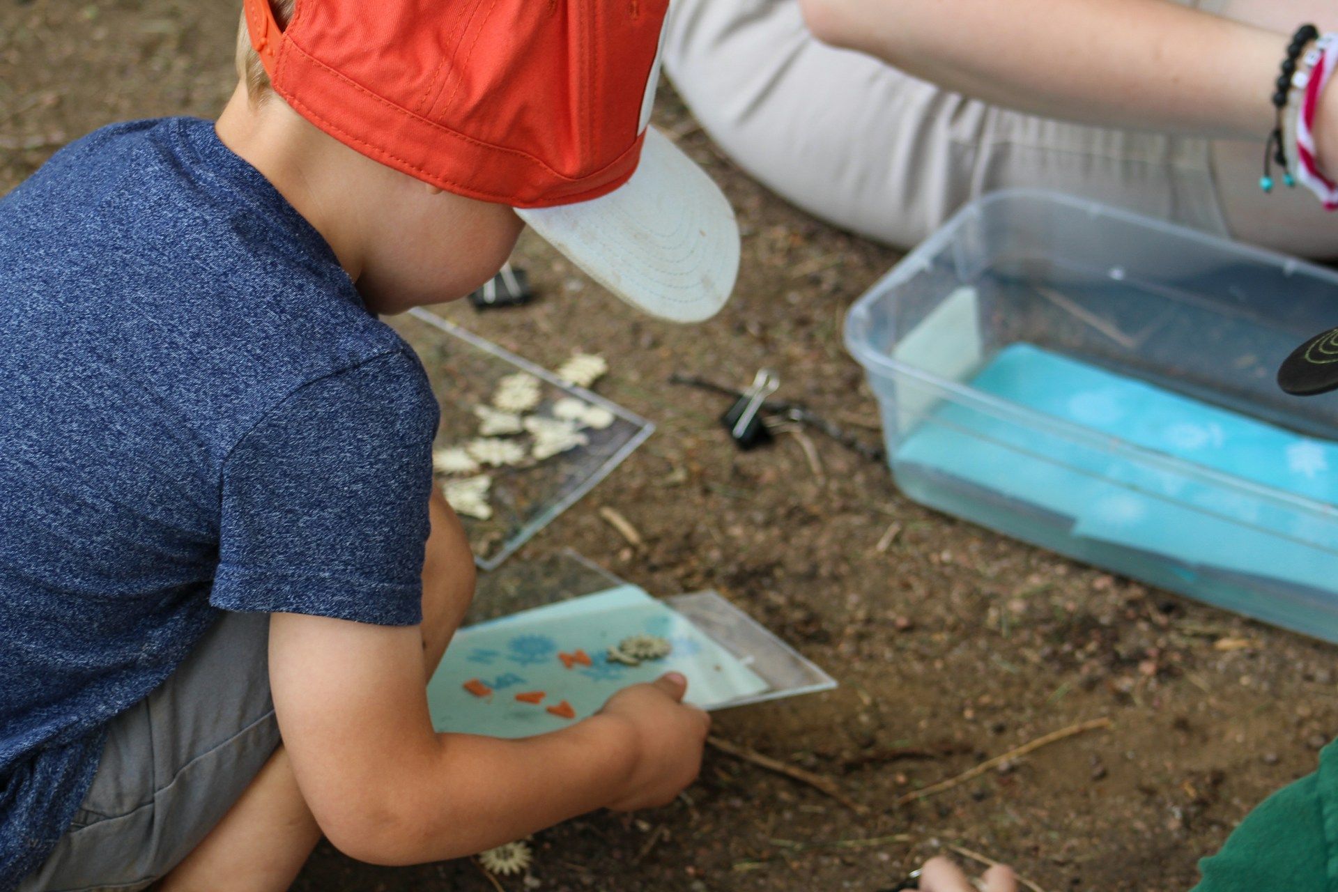 A child creating a craft at a Bee Bunch camp at The Broadmoor